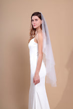 Load image into Gallery viewer, ISABELLA - one layer fingertip length barely-there cut veil in Italian style tulle